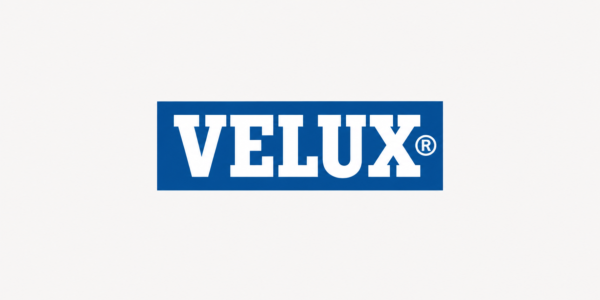The image shows the VELUX logo with bold white letters on a blue rectangular background.